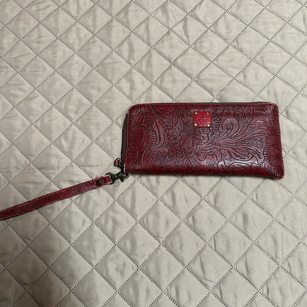 STS Large Clutch wallet. Red. Some wear as indicated.